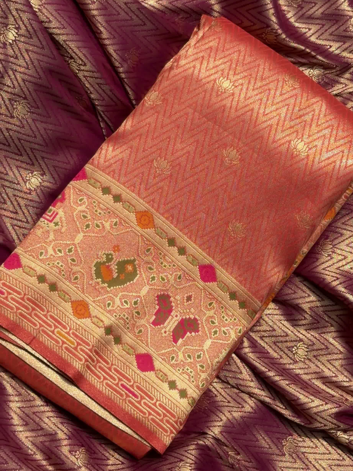 Patola Weave Banarasi Silk Saree with Animal Motif in Coral Peach