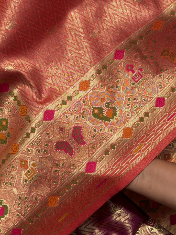 Patola Weave Banarasi Silk Saree with Animal Motif in Coral Peach