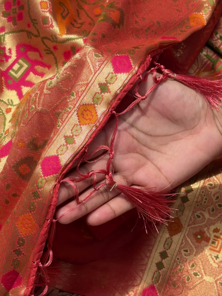 Patola Weave Banarasi Silk Saree with Animal Motif in Coral Peach