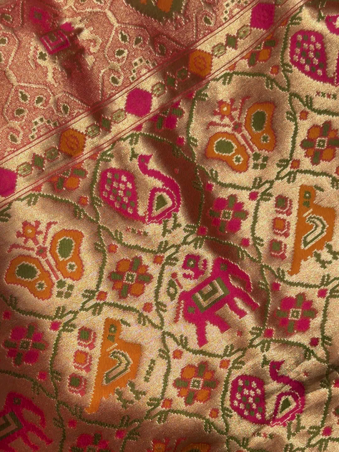 Patola Weave Banarasi Silk Saree with Animal Motif in Coral Peach