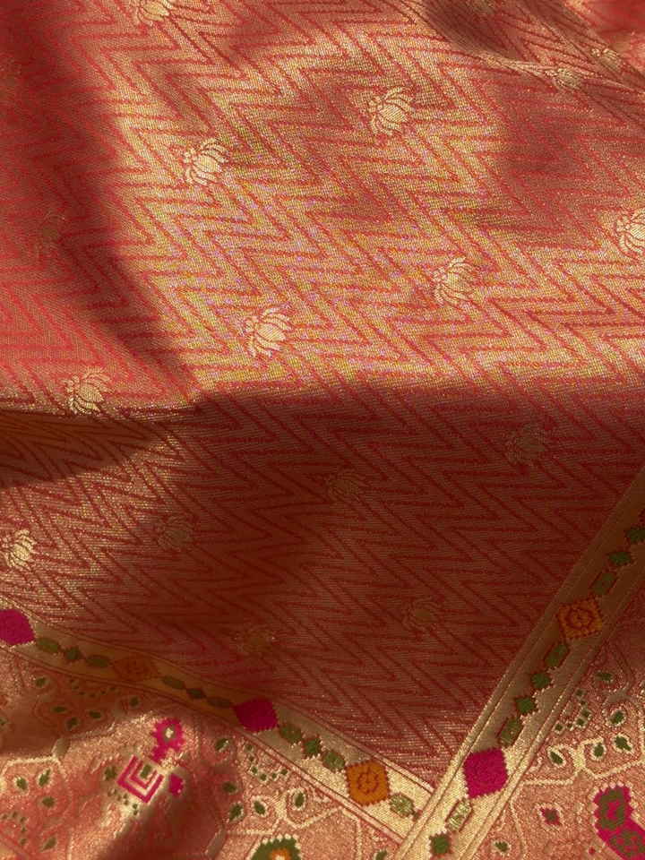 Patola Weave Banarasi Silk Saree with Animal Motif in Coral Peach