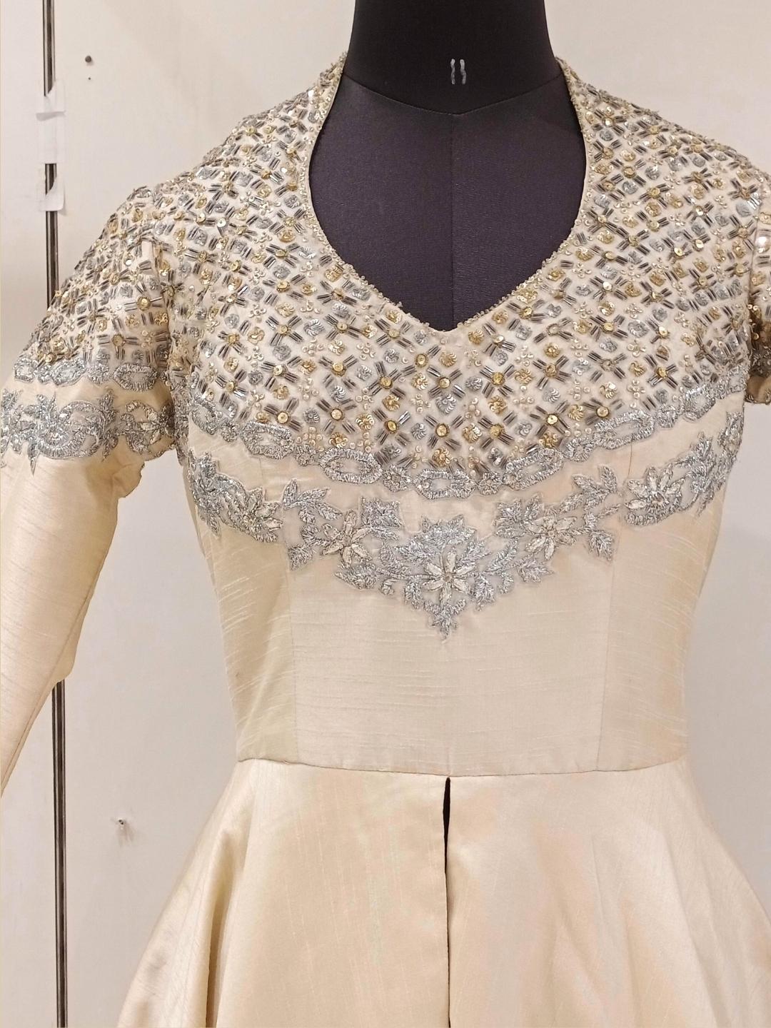 Cream Heavy Neck Embellished High Low Flared Gown Dress