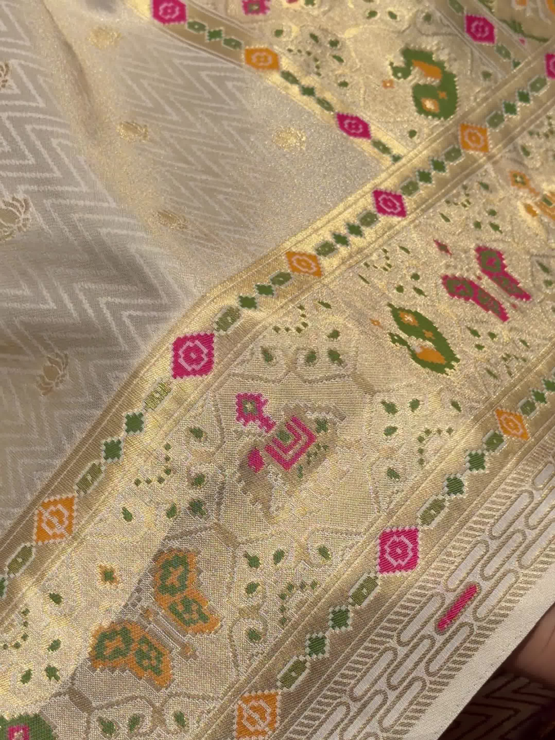 Patola Weave Banarasi Silk Saree with Animal Motif in Cream