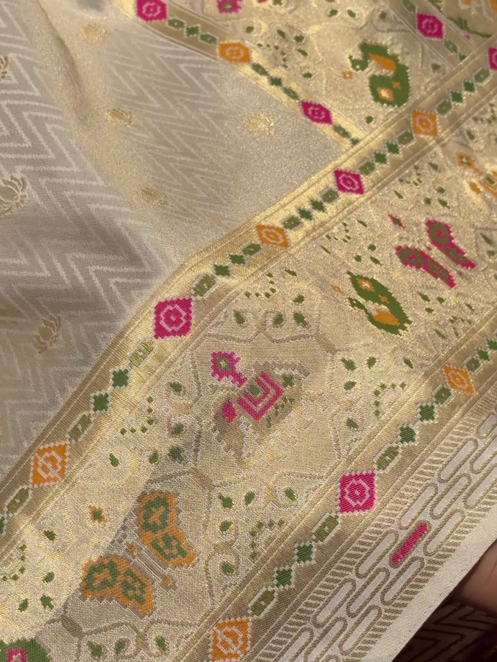 Patola Weave Banarasi Silk Saree with Animal Motif in Cream