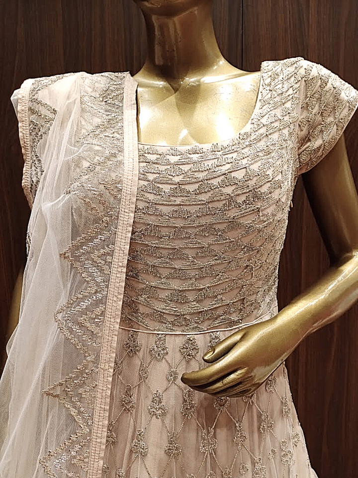 Beige Net Anarkali With Heavy Embroidery And Dupatta