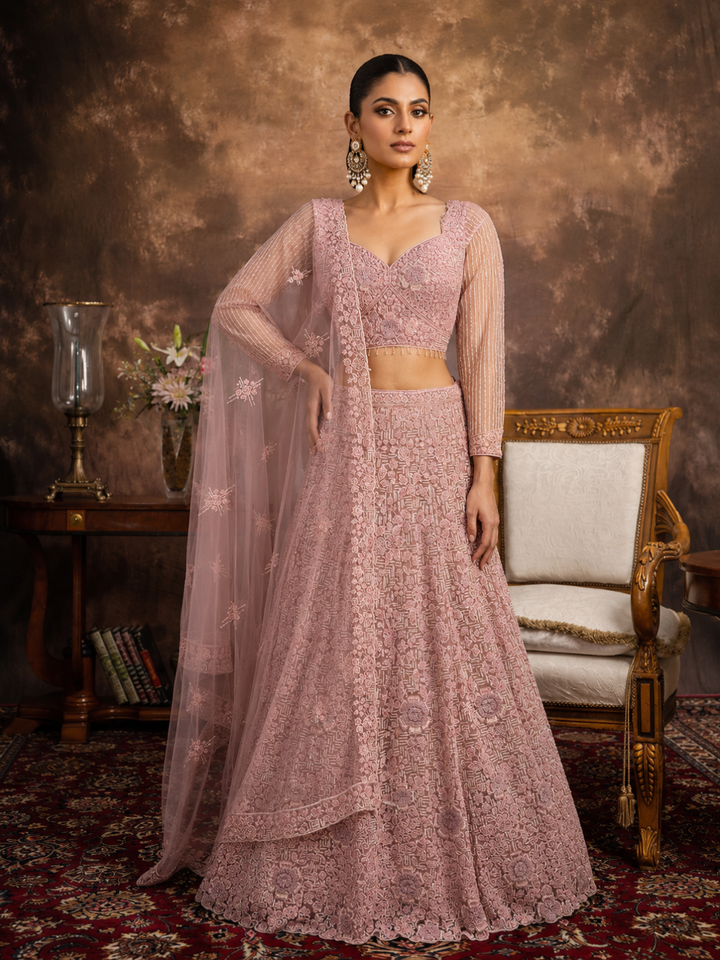 Dusty Pink Net Lehenga Choli with Heavy Resham, Cutdana & Pearl Embroidery with Sequin Striped Sleeves & Net Dupatta