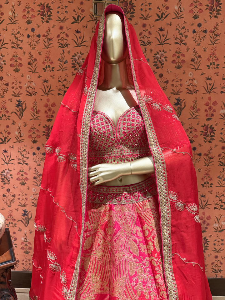 Banarasi Silk Zari Woven & Embroidered Bridal Lehenga Set with Dupatta in Coral Red & Pink