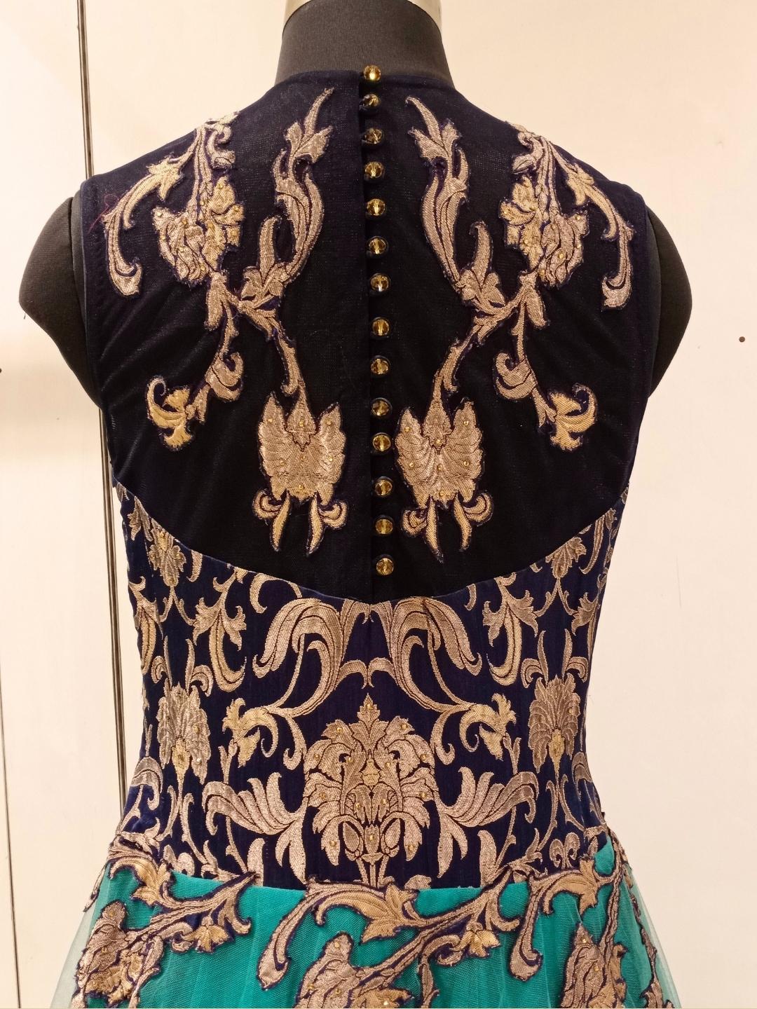 Peacock Shades Embellished Stylized Flared Net Gown Dress