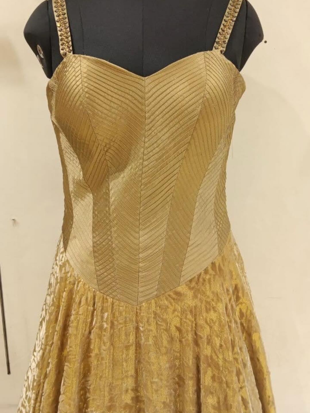 Golden Woven Rich Look Embellished Stylized Long Flared Gown Dress