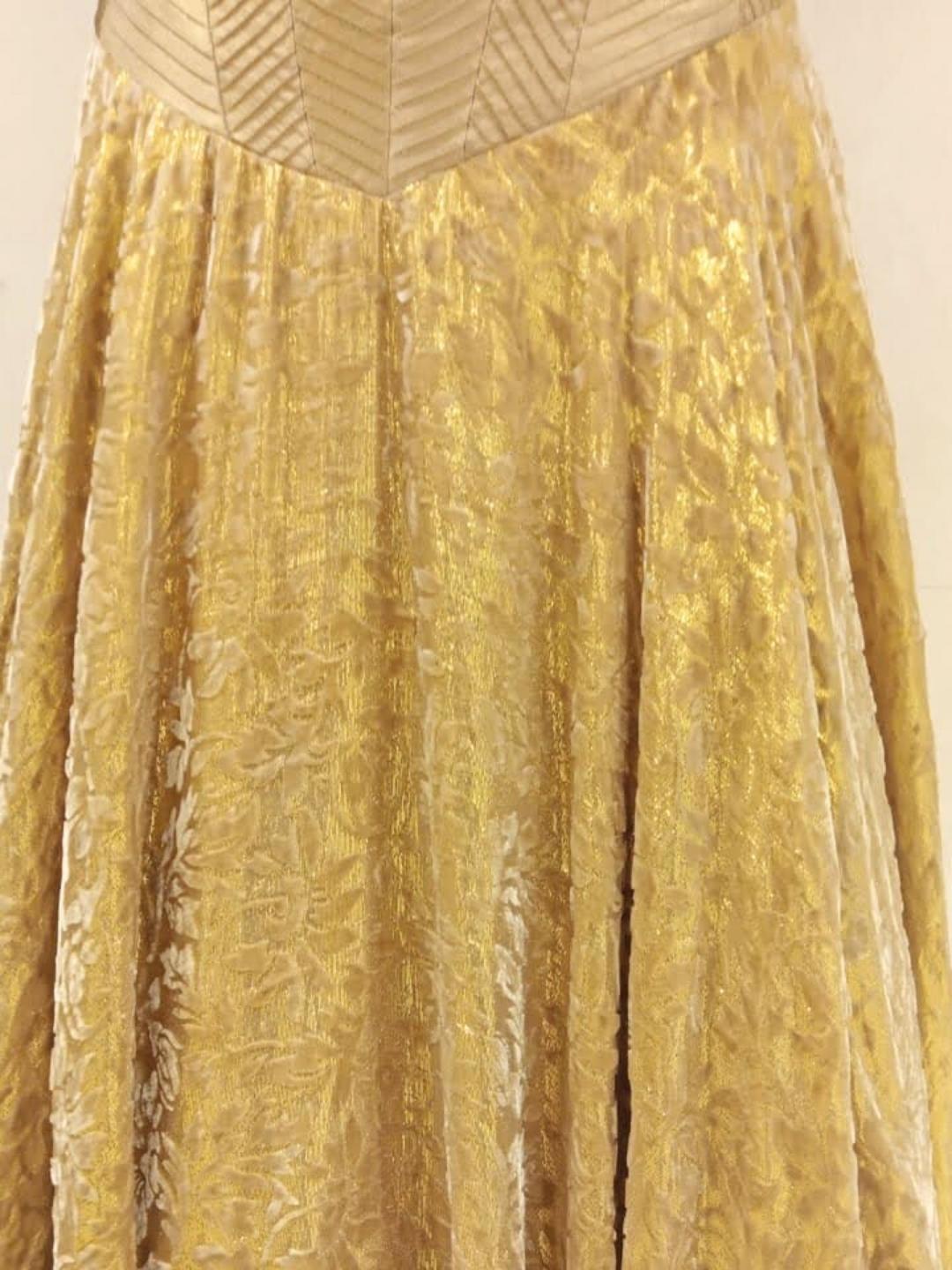 Golden Woven Rich Look Embellished Stylized Long Flared Gown Dress