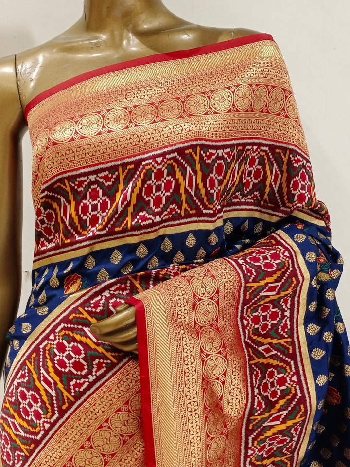 Chhabra 555 Navy Blue Banarasi Silk Blend Ethnic Saree Embellished With Bold Border
