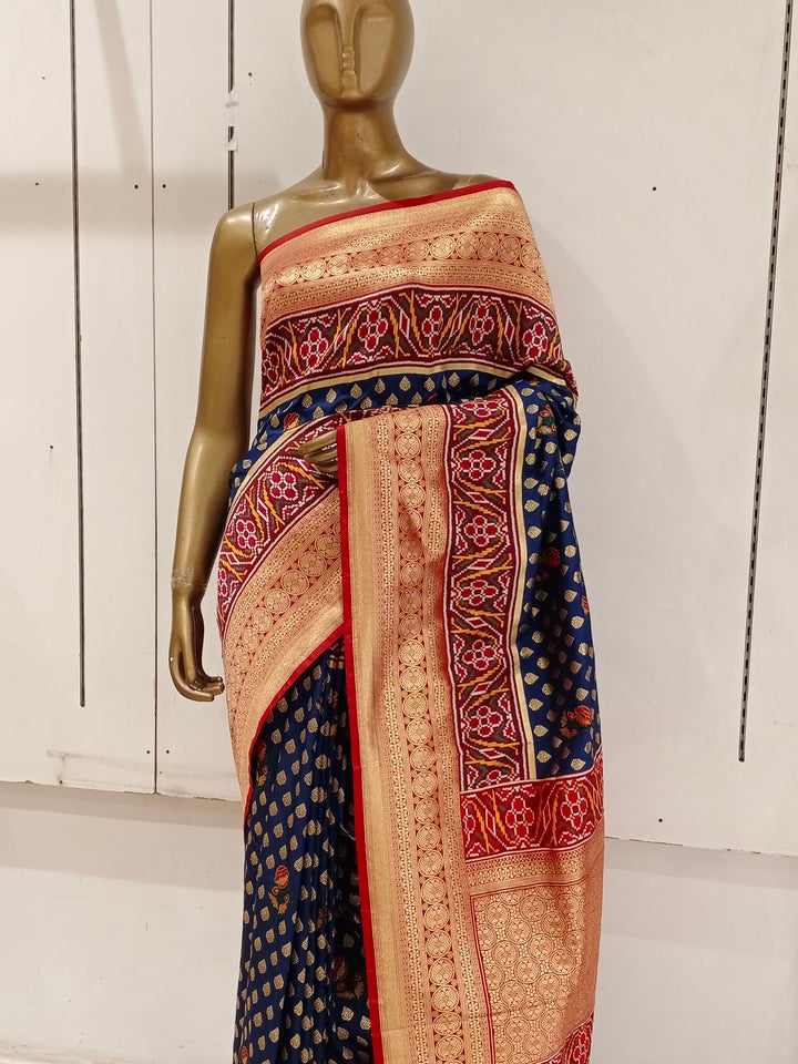 Chhabra 555 Navy Blue Banarasi Silk Blend Ethnic Saree Embellished With Bold Border