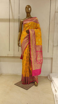 Chhabra 555 Yellow Zari Woven Ethnic Motifs Embellished Saree With Contrast Pallu