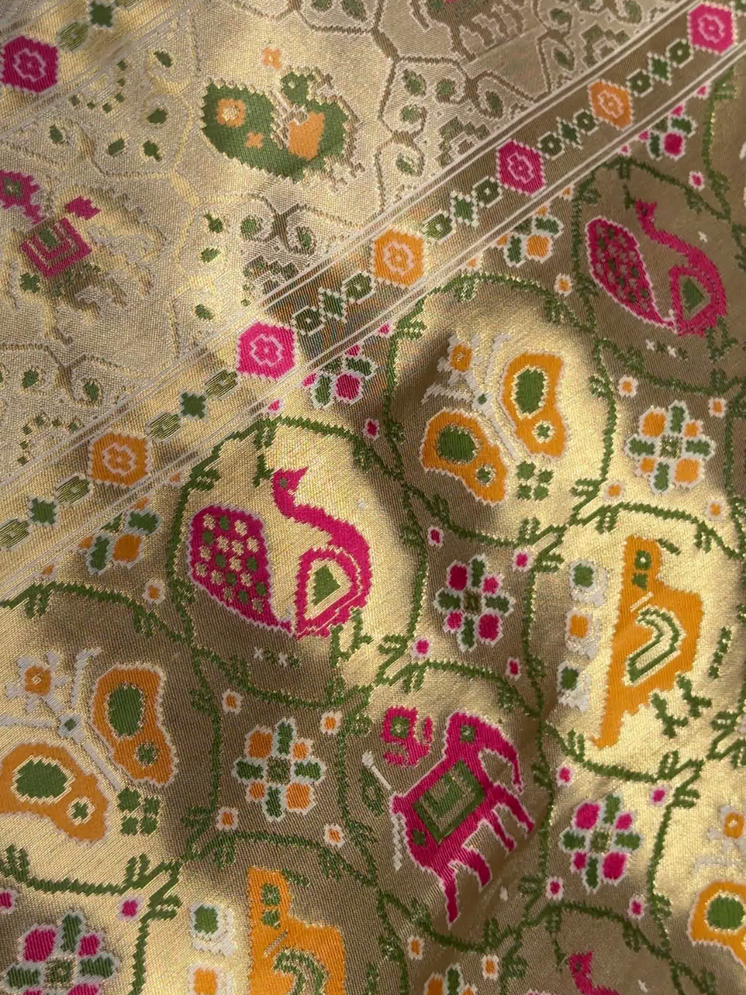 Patola Weave Banarasi Silk Saree with Animal Motif in Cream