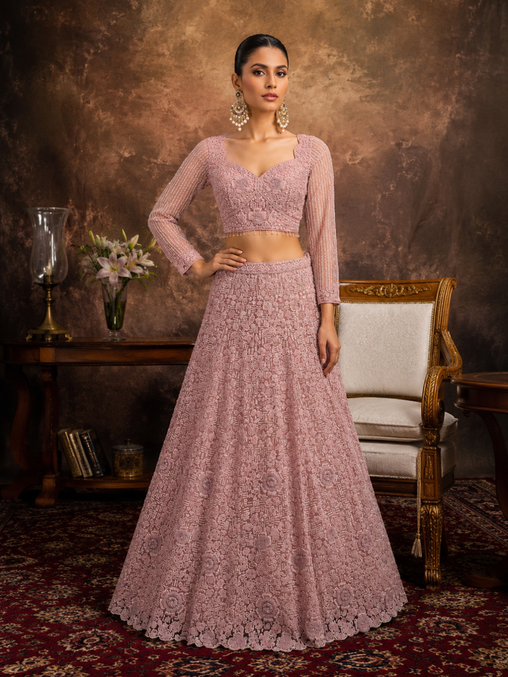 Dusty Pink Net Lehenga Choli with Heavy Resham, Cutdana & Pearl Embroidery with Sequin Striped Sleeves & Net Dupatta