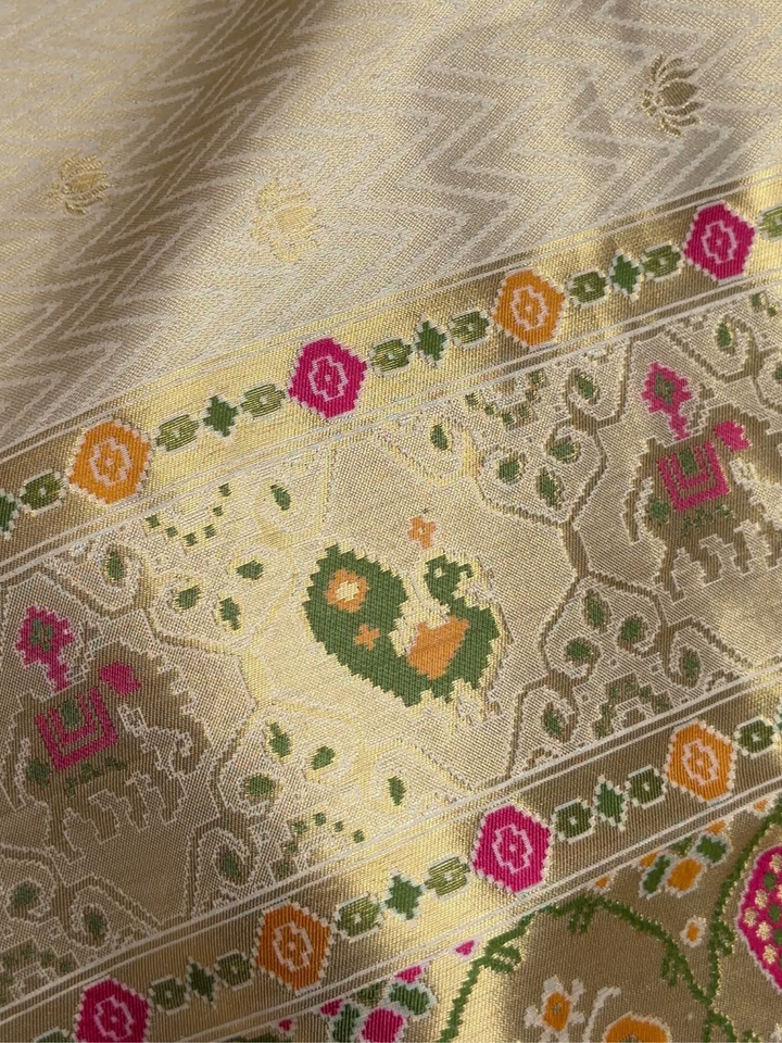 Patola Weave Banarasi Silk Saree with Animal Motif in Cream
