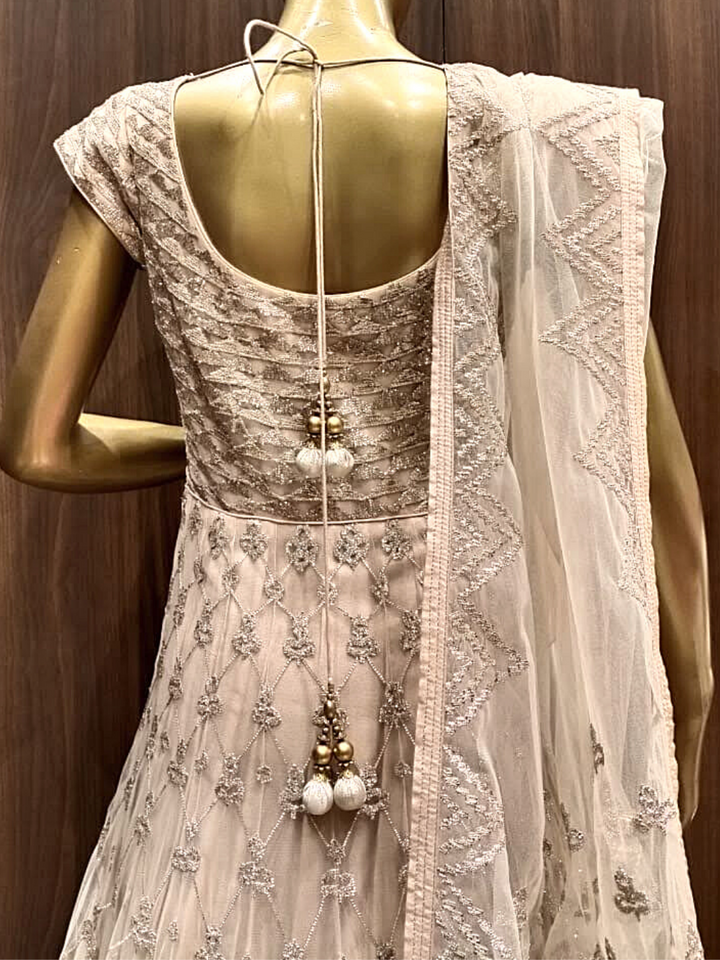 Beige Net Anarkali With Heavy Embroidery And Dupatta