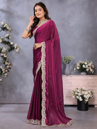 Solid saree with embellished scalloped border and zari-embroidered blouse.