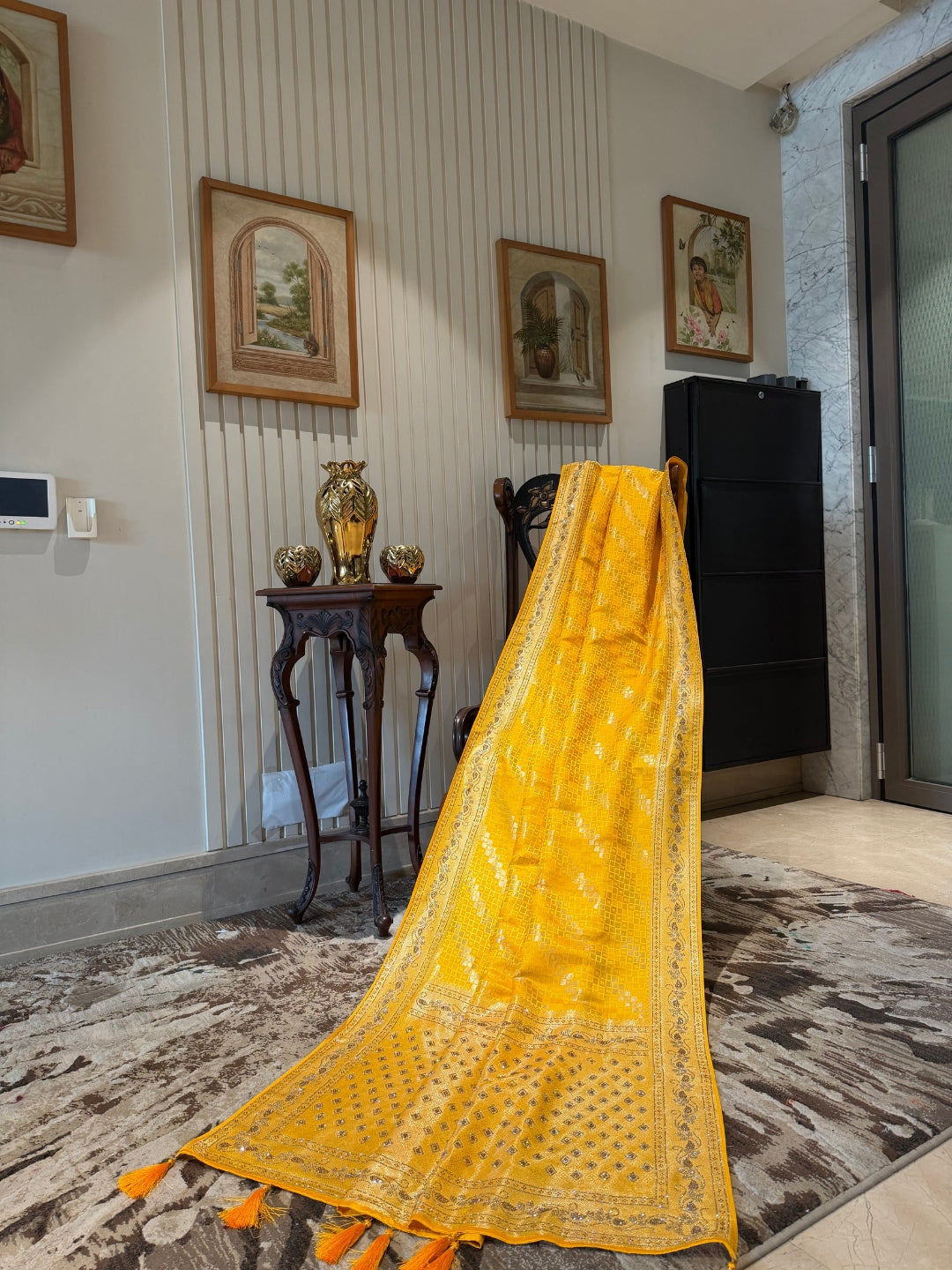 Yellow Banarasi Woven Checks Saree with Intricate Zari Border and Tasselled Pallu
