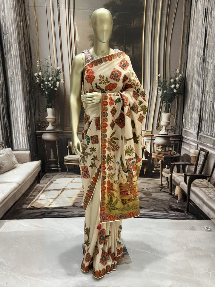 Ivory Banarasi Silk Saree with Multicolour Village Scene Pallu & Floral Temple Border