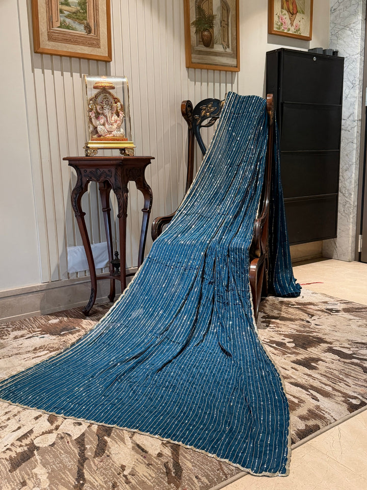 Teal Blue Saree with All-Over Vertical Sequin Stripe Work and Subtle Scallop Border