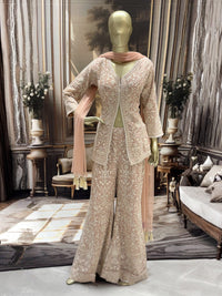 Thread embroidered kurta palazzo set with sequins and tasselled dupatta.