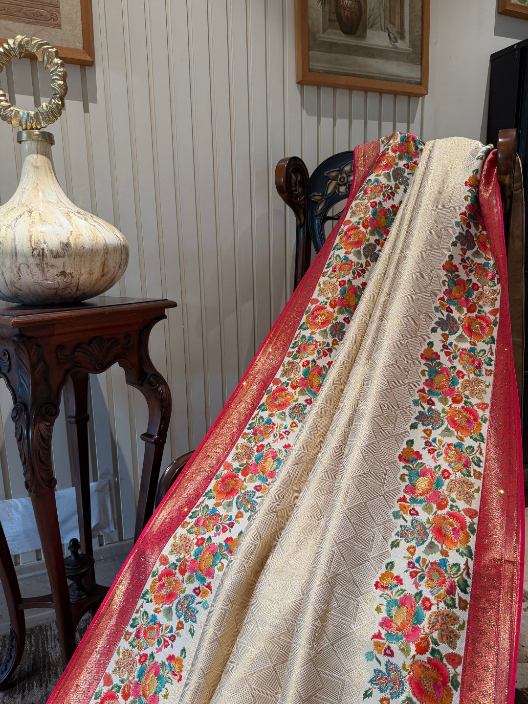 Cream Saree with Multicolour Floral Woven Panels, Red Zari Border & Tassel Pallu