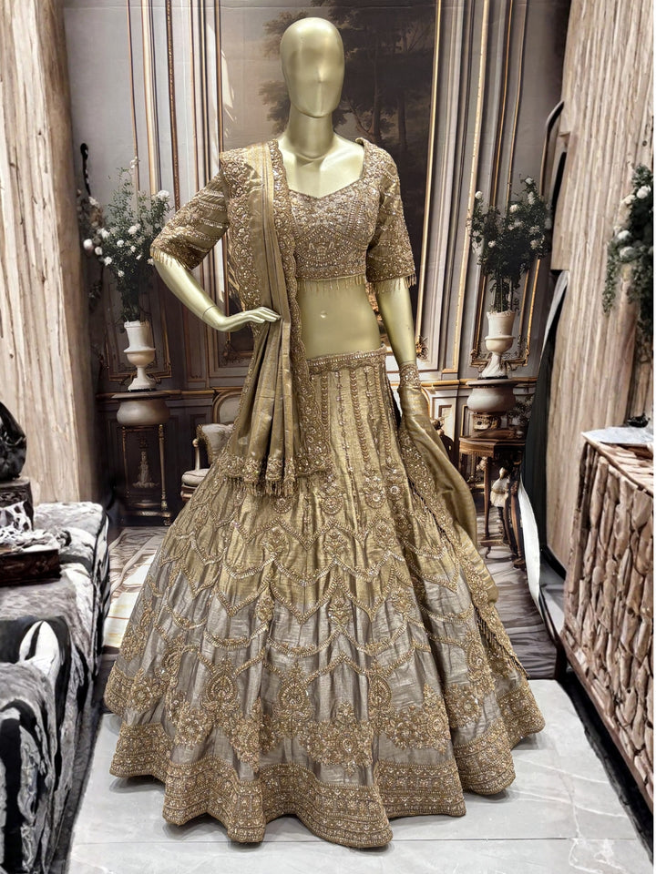 Art silk lehenga set with heavy zari, sequin embroidery & scalloped dupatta.
