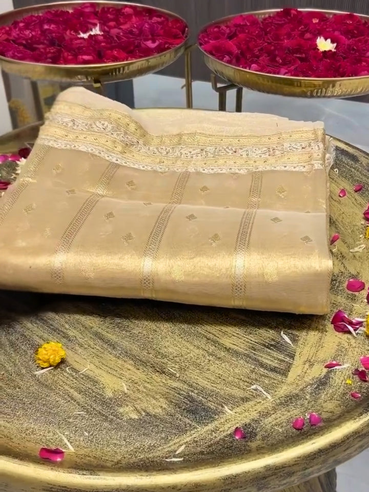 Beige color Beads & Stones Worked Border with Ethnic Motifs Zari woven traditional saree