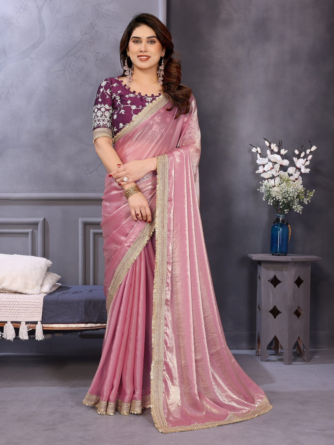Shimmer solid saree with embellished border & contrast floral embroidered blouse.