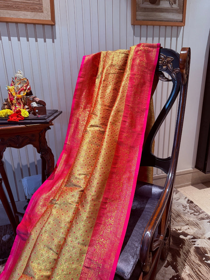 Golden Pink Zari Woven Banarasi Saree with Polka Dot Body & Floral Brocade Border