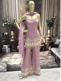 Art silk kurta palazzo set with pearl, bead & zari elephant scene embroidery.