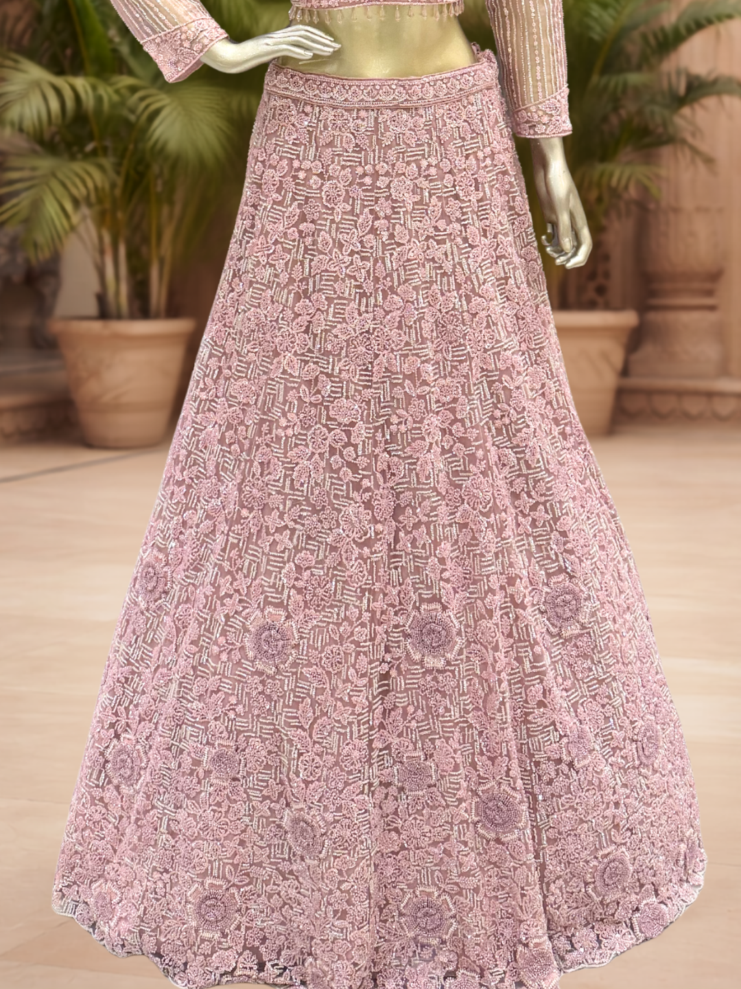 Dusty Pink Net Lehenga Choli with Heavy Resham, Cutdana & Pearl Embroidery with Sequin Striped Sleeves & Net Dupatta