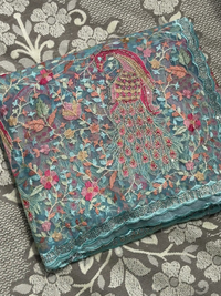 Peacock Floral Embroidered Net Saree in Teal Blue