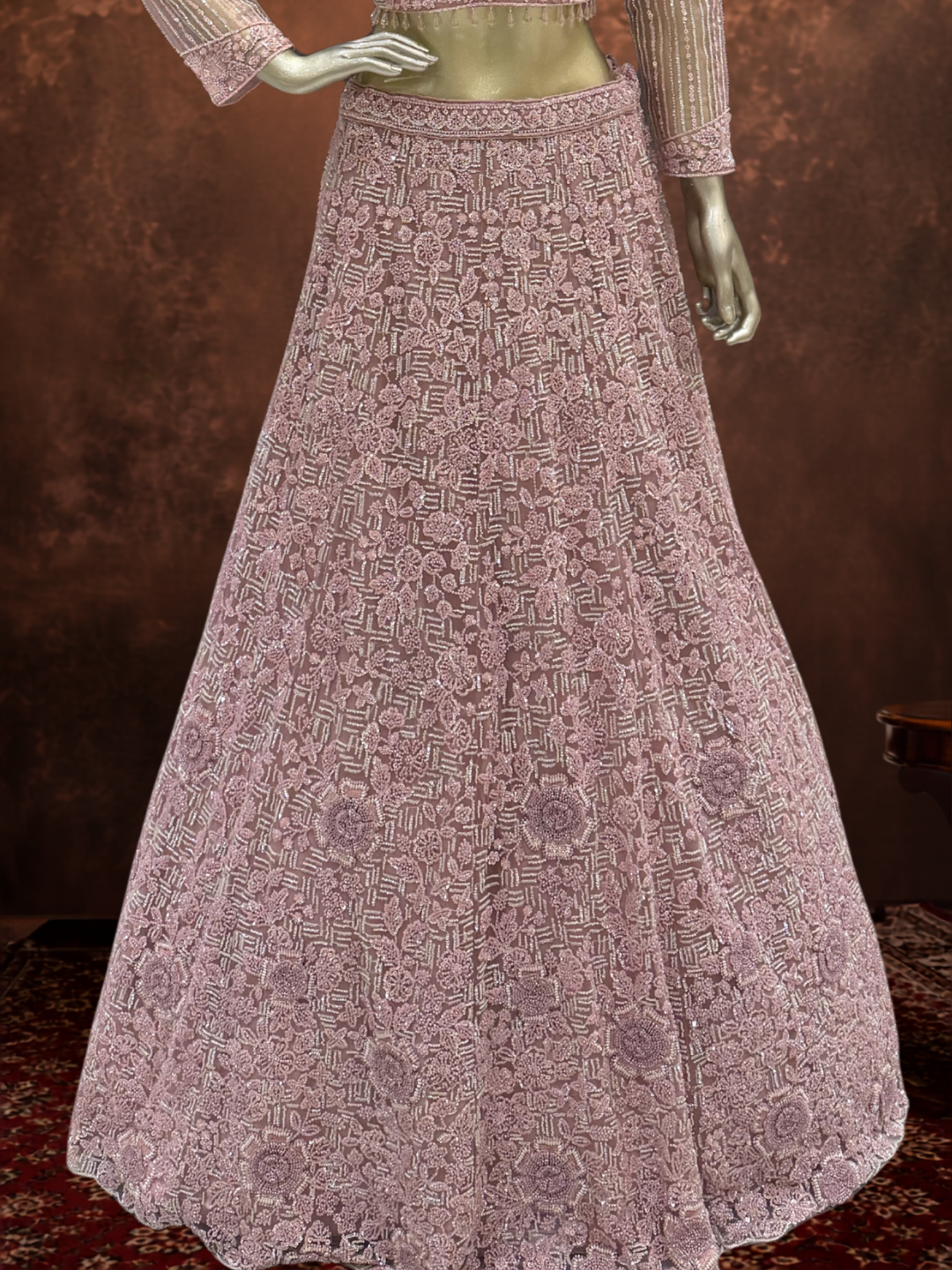 Dusty Pink Net Lehenga Choli with Heavy Resham, Cutdana & Pearl Embroidery with Sequin Striped Sleeves & Net Dupatta