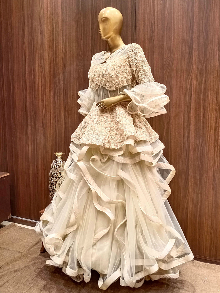 Gold Flared Net Gown with Ribbon Embroidery & Ruffles And Layering