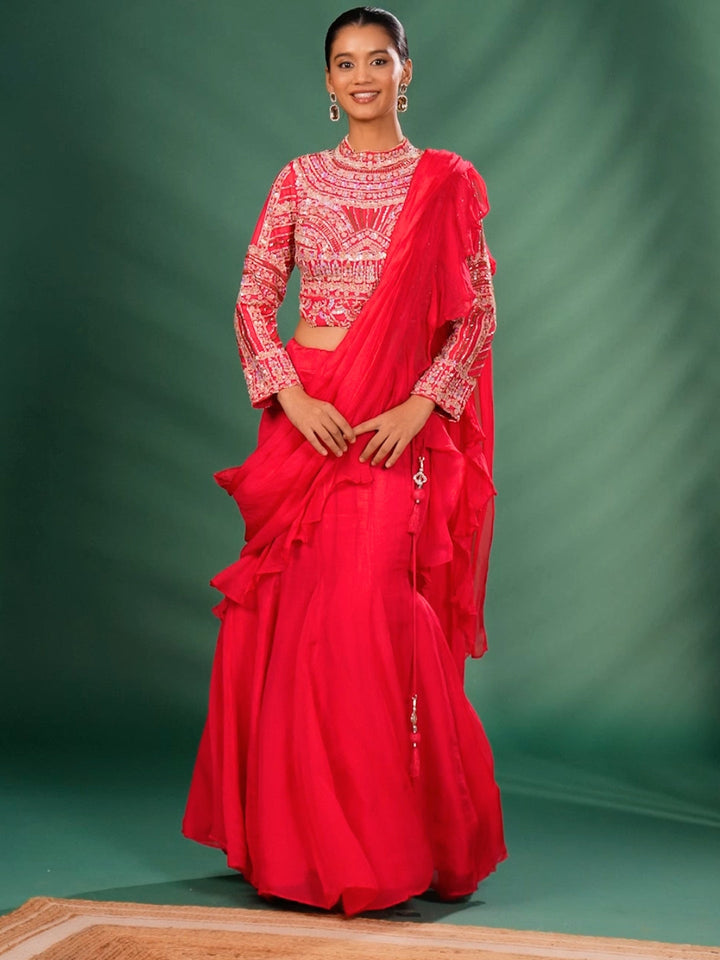 Intricate Embroidery with Floral Motifs & Sequin Detailing Blouse and Ruffled Lehenga with attached Dupatta