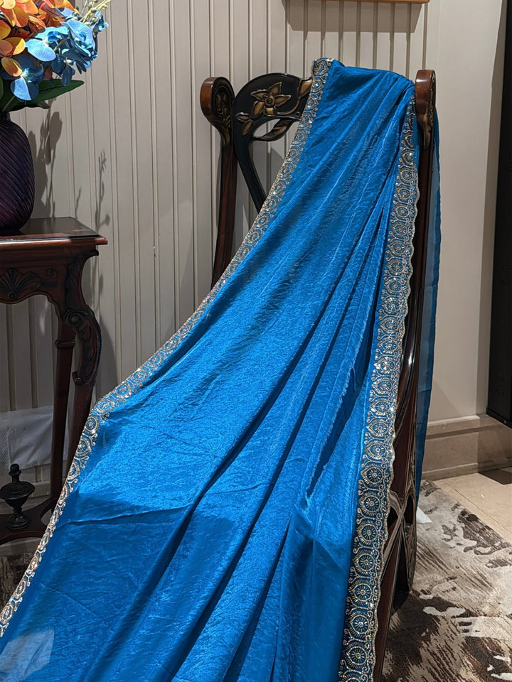 Shimmer Georgette Saree with Intricate Silver-Blue Sequin Embroidered Border
