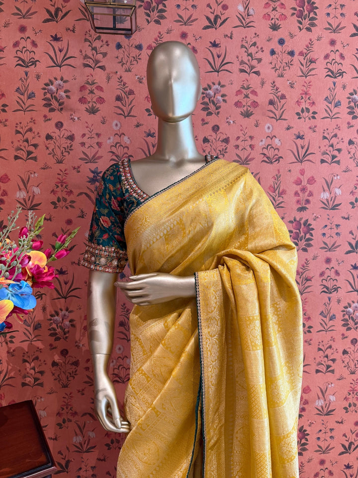 Yellow Jacquard Silk Woven Zari Saree with Slim Embellished Border for Festive Haldi Wear.