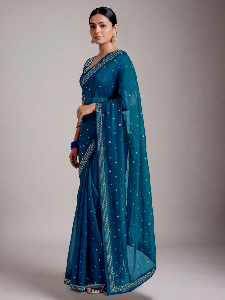 Sequin Embellished Saree with Floral Border and Embroidered Blouse Peice