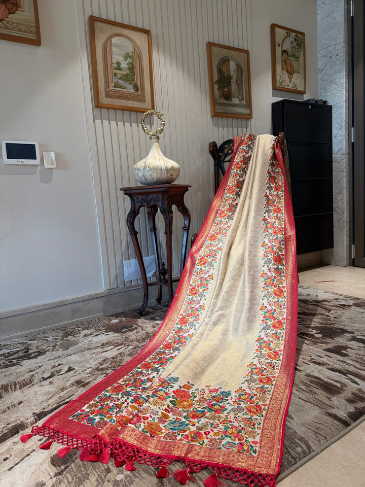 Cream Saree with Multicolour Floral Woven Panels, Red Zari Border & Tassel Pallu