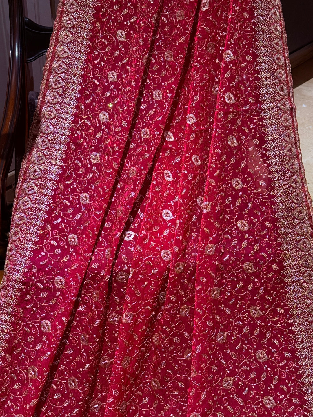 Pinkish Red Saree with Heavy Golden Zari Embroidery & Ornate Floral Motif Border Work