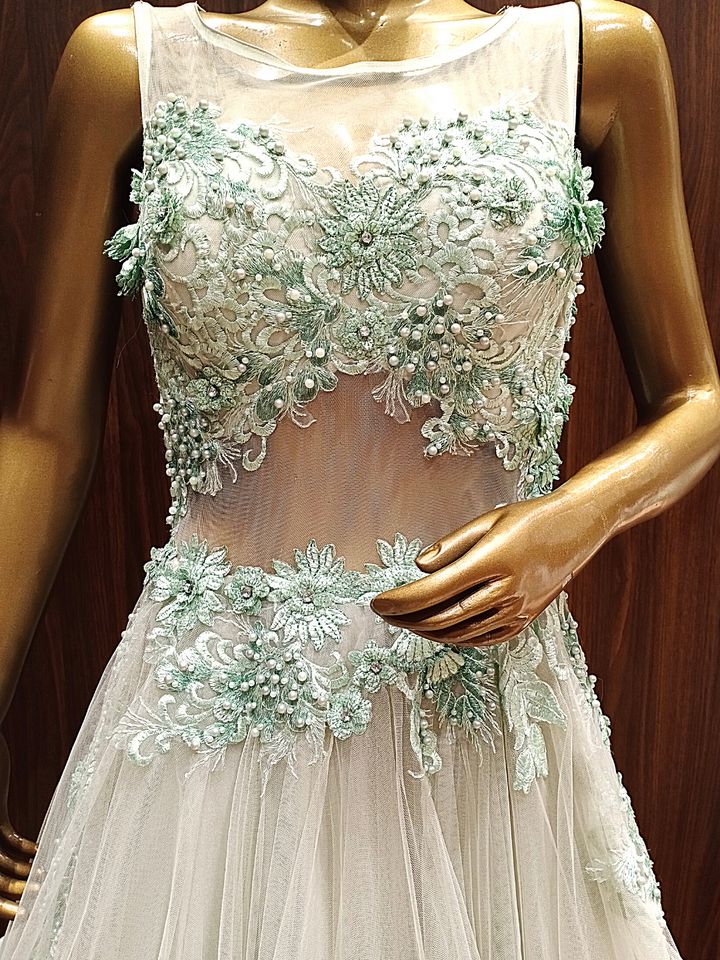 Pastel Green Ruffled Net Gown with Pearl,Thread Embroidery and Layering