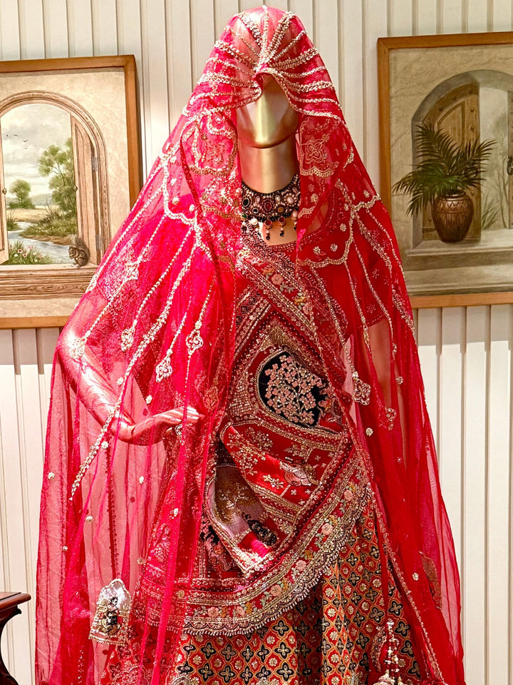 heritage-themed embroidery lehenga choli embellished blouse and a Sequins and Zari work dupatta