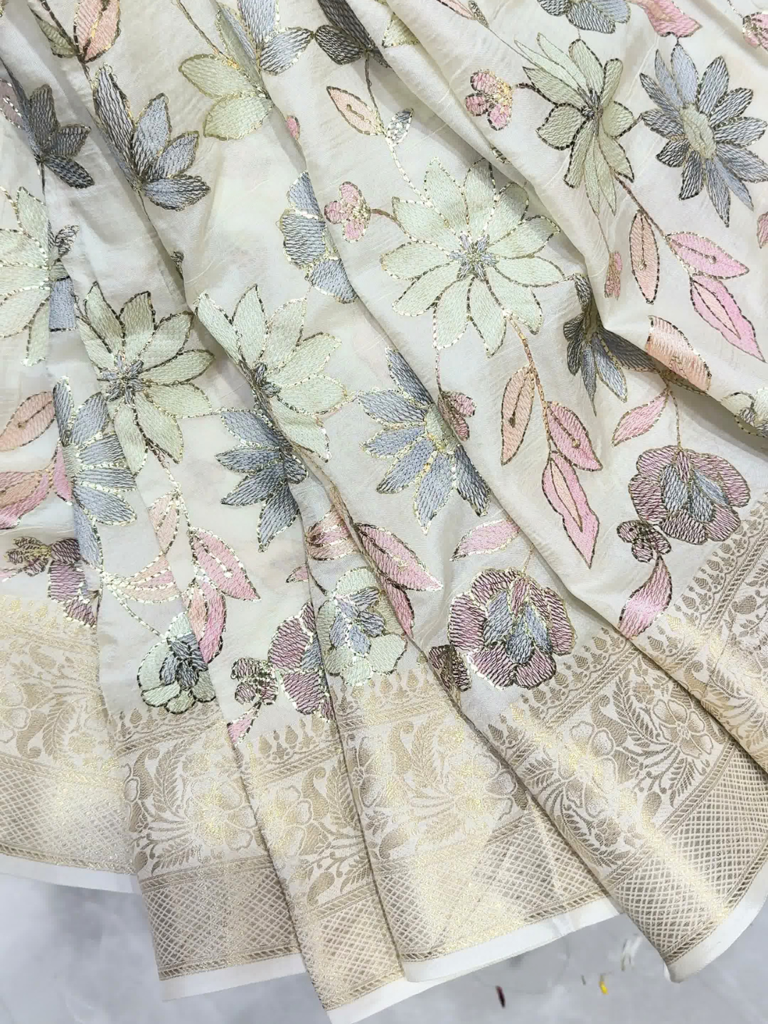 Off White Banarasi Silk Saree with Floral Embroidery and Zari Woven Border
