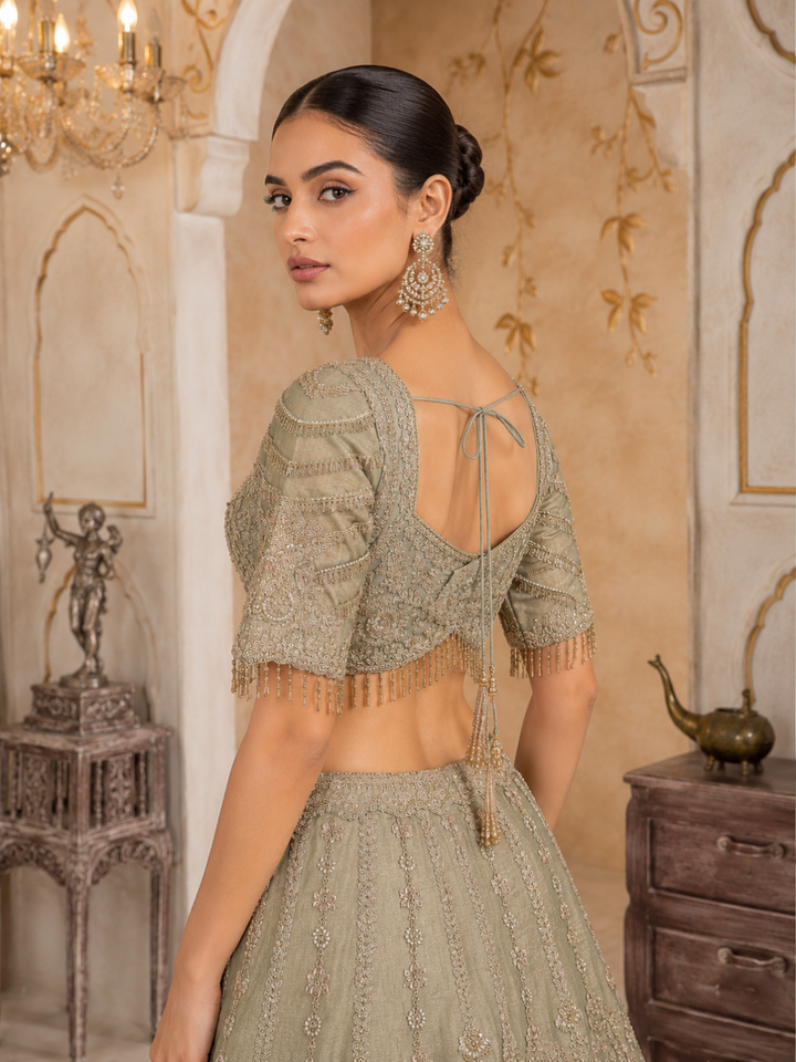 Sage Green Ombre Silk Bridal Lehenga Choli with Heavy Zari, Resham & Cutdana Floral Embroidery with Crystal Tassel Hem & Dupatta