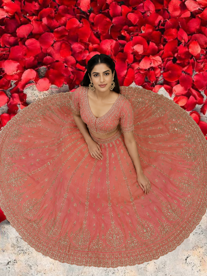 Coral Pink Silk Lehenga Choli with Zari, Sequin & Pearl Floral Booti Embroidery with Pearl Tassel Hem & Net Dupatta