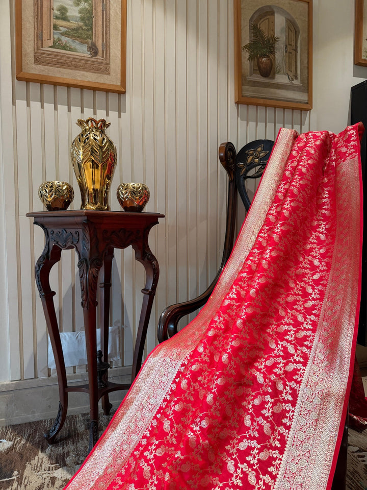 Red Floral Jaal Zari Woven Banarasi Art Silk Saree with Broad Golden Borders.