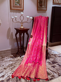Pink Banarasi Saree with All-over Gold Zari Buta and Dual-Tone Geometric Woven Border