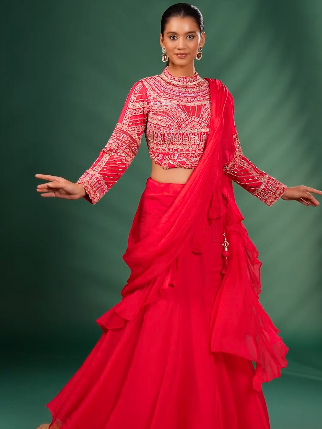 Intricate Embroidery with Floral Motifs & Sequin Detailing Blouse and Ruffled Lehenga with attached Dupatta